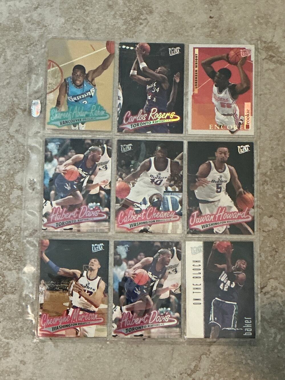 9 fleer ultra basketball card lot with sleeve”.